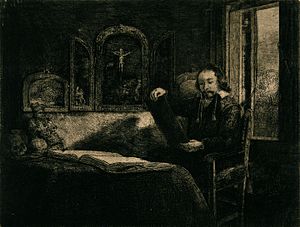 A man seated at his desk studying a sheet of paper. Etching. Wellcome V0049109.jpg